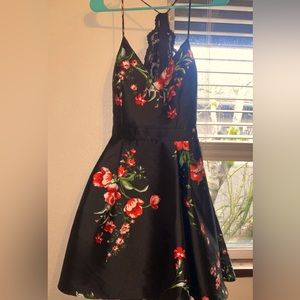 Black w/ roses. knee length dress